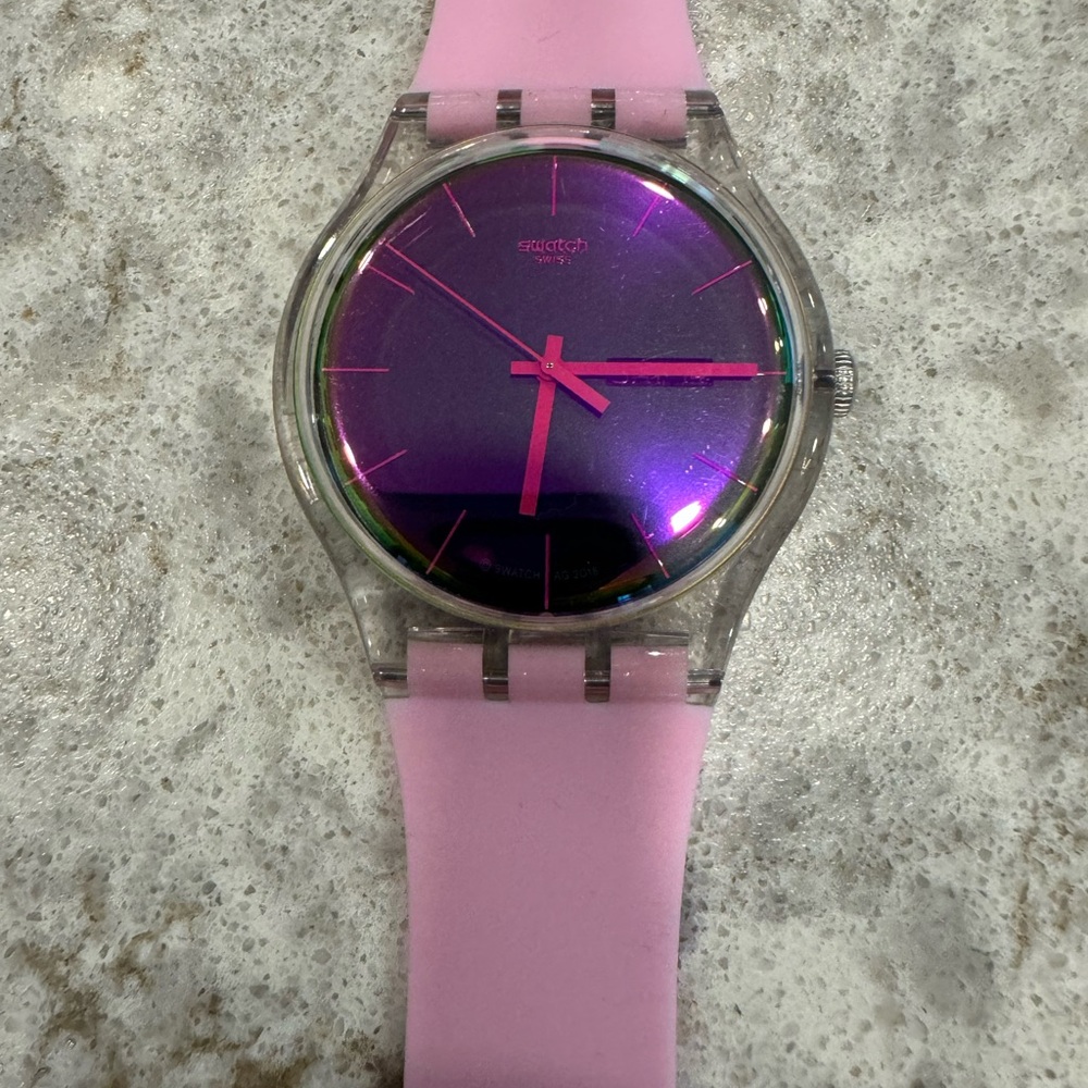 SWATCH watch - light pink band with iridescent watch face; Day & Date settings